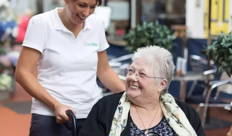 What is person-centred care and how does it work in live-in and visiting care?