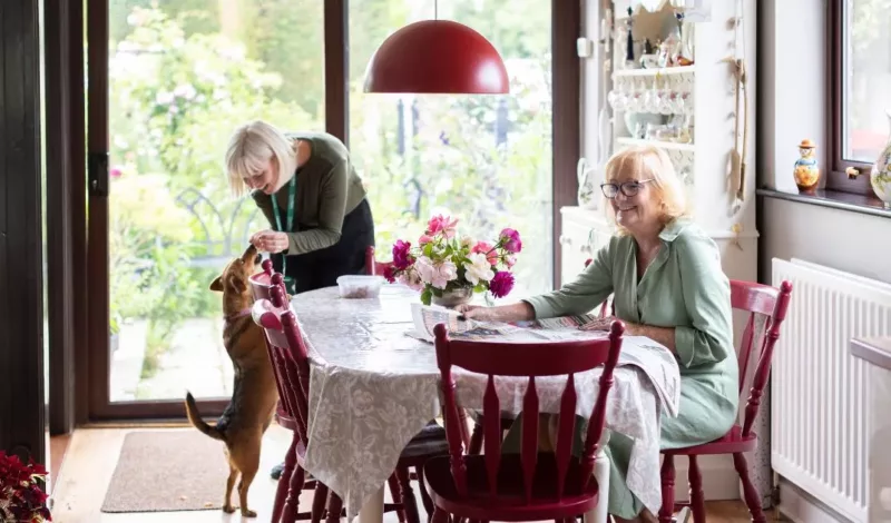 A care professional assisting a senior with daily tasks as part of a care needs assessment evaluation Homecare in Bournemouth